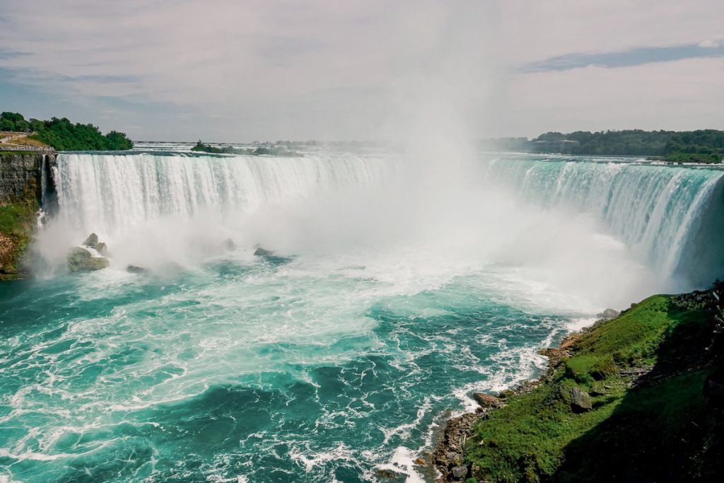 Masses of water dropping down the Niagara Falls in New York