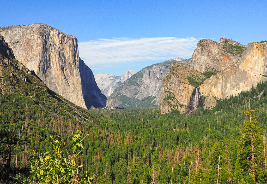 Stunning views of the rock formations and a waterfall from Tunnel View in Yosemite National Park