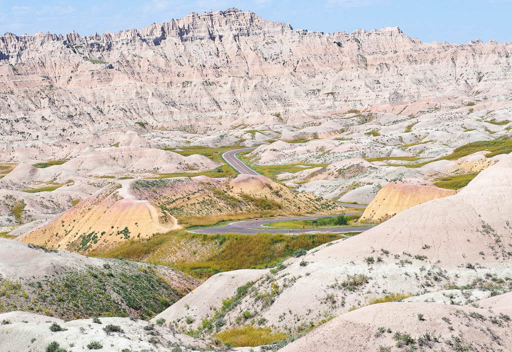 See the yellow mounds while driving Badlands Loop Road