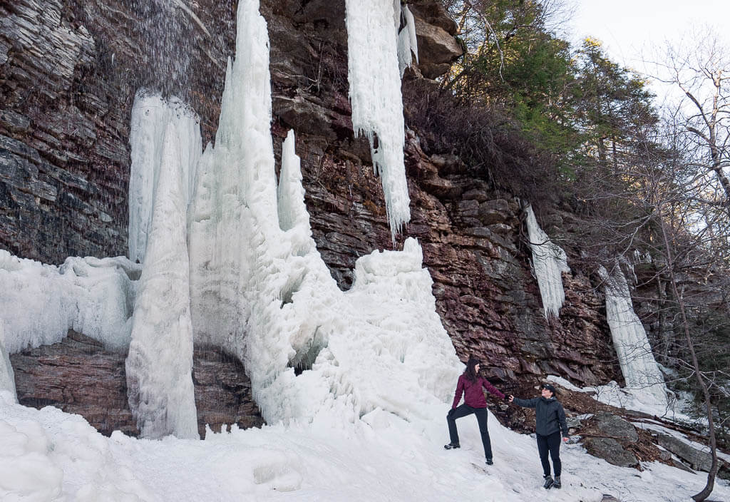 Us in front of frozen Rainbow Falls Minnewaska State Park