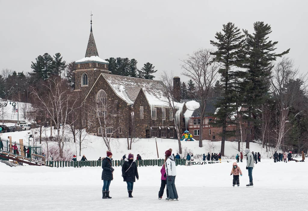 People ice skating in the winter in Lake Placid