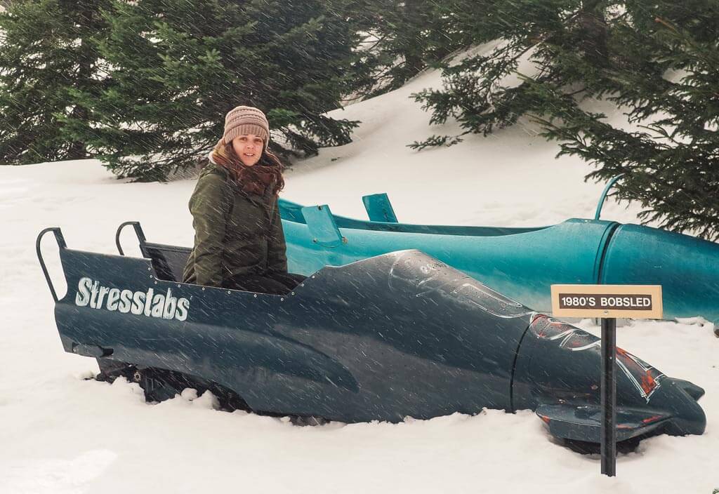 Dana sitting in a bobsled