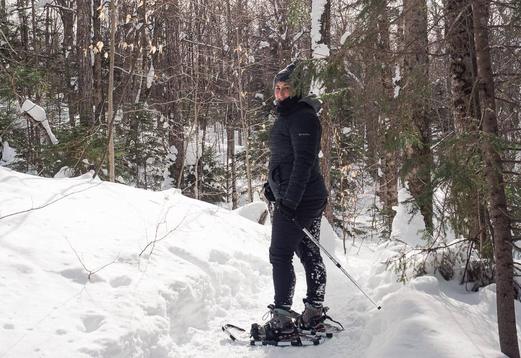 Rachel snowshoeing in the winter in Lake Placid