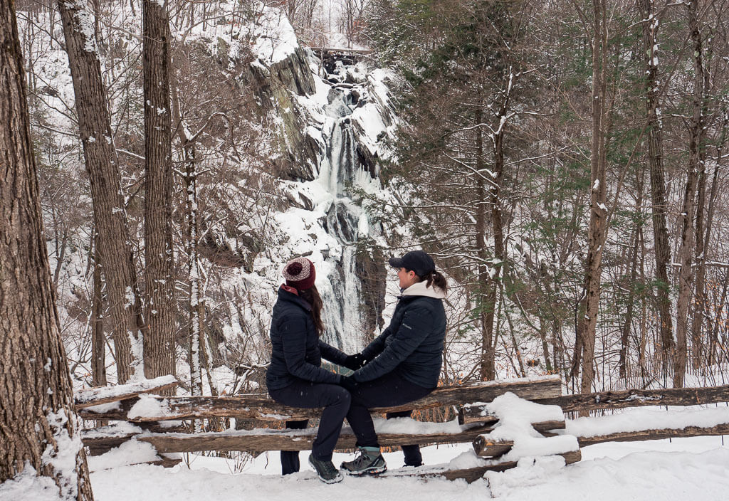 Us sitting on a bench overlooking High Falls, one of the waterfalls in NY