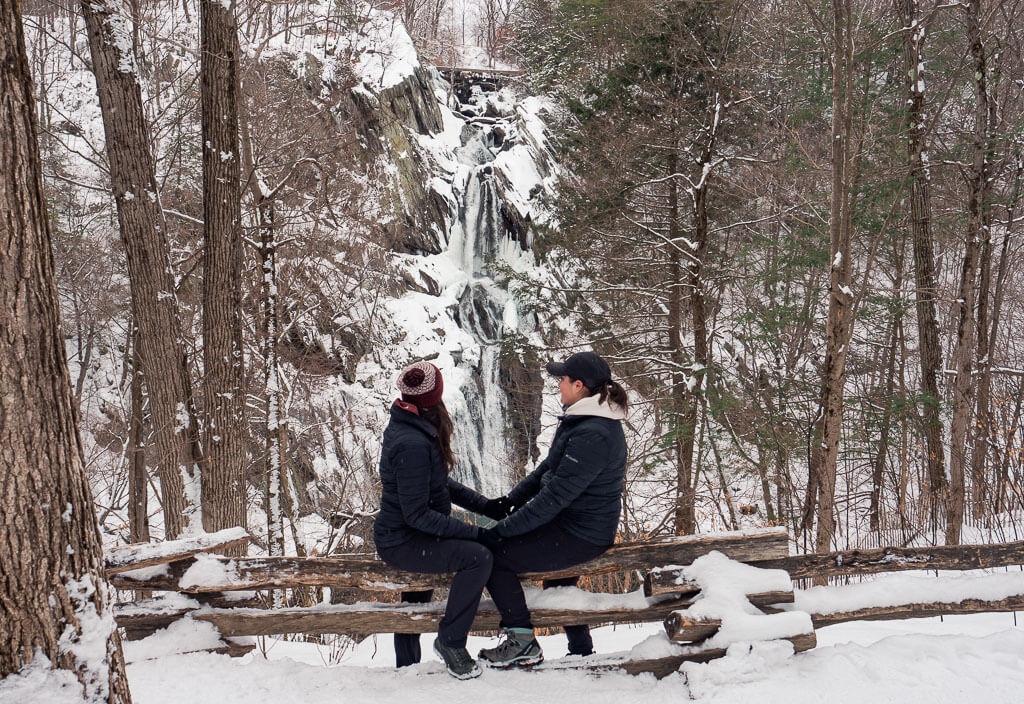 Us sitting on a bench overlooking High Falls