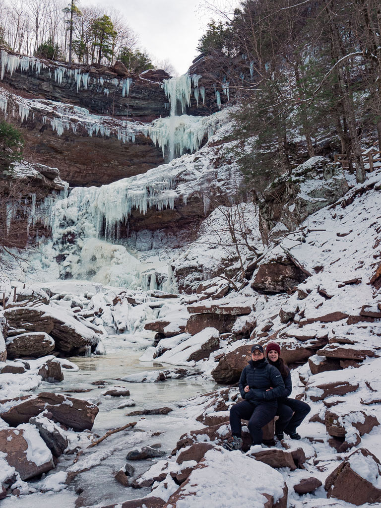 Us sitting in front of the Kaaterskill Falls in the winter