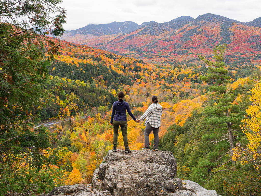 Us standing on top of the Roaring Brook Falls overlooking the Valley