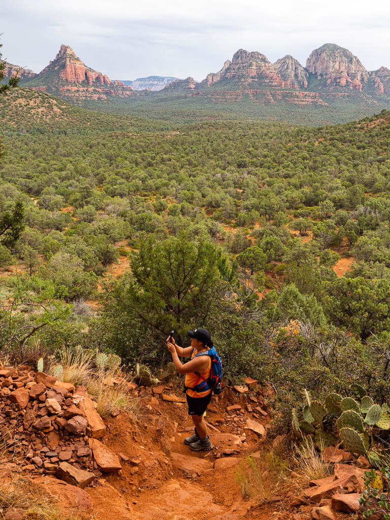 Rachel walking down from the inside of the Birthing Cave Sedona