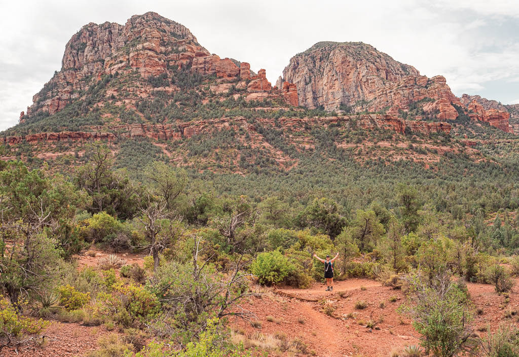 Rachel admiring the red rock landscape on a hike in Sedona