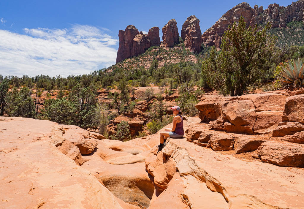 Dana sitting at the Seven Sacred Pools Sedona