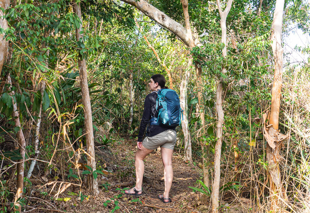 Dana brings different hiking supplies on her hike in the jungle