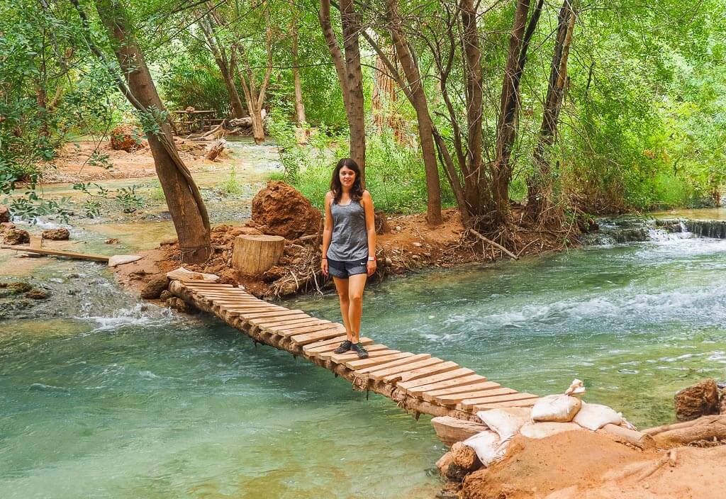 Dana standing on a bridge at the Havasupai Falls campground