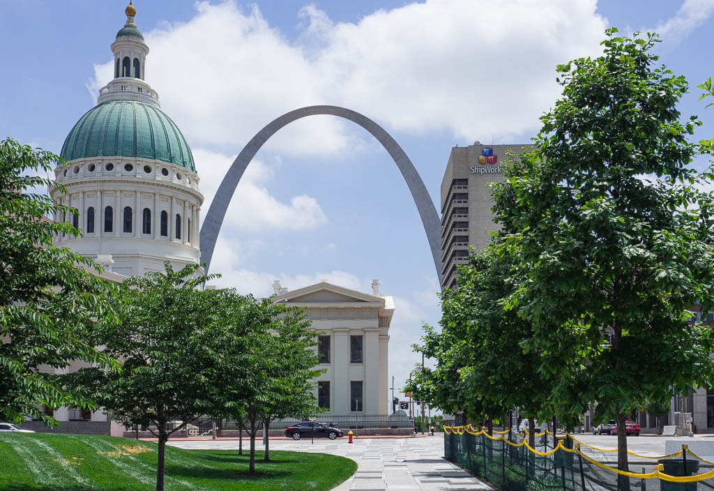 Walking towards the tall Gateway Arch