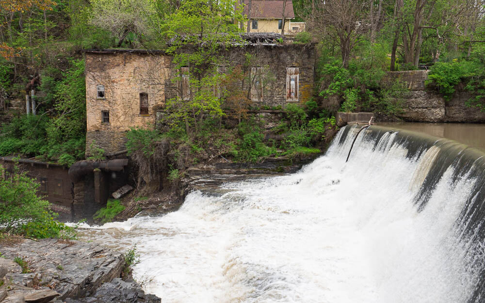 Wells Falls is rushing down next to some ruins