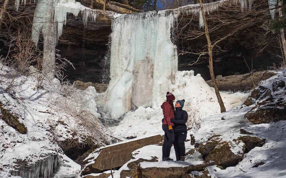 Us standing in front of Tinker Falls