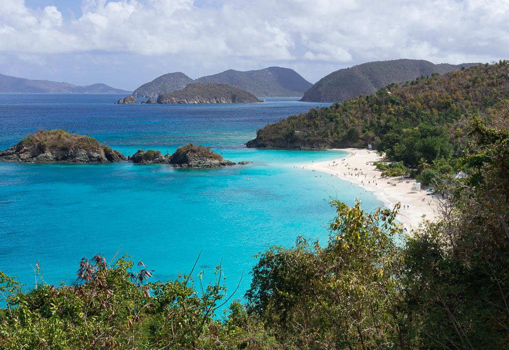 Beautiful white beach and turquoise waters at Trunk Bay