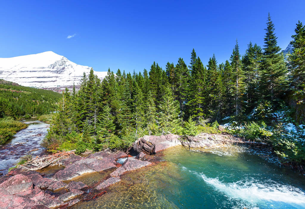 Clear waters and high mountains in Glacier National Park