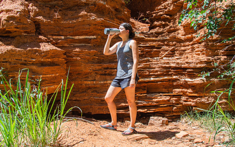 Make sure to bring one of the best gifts for hikers: an insulated water bottle