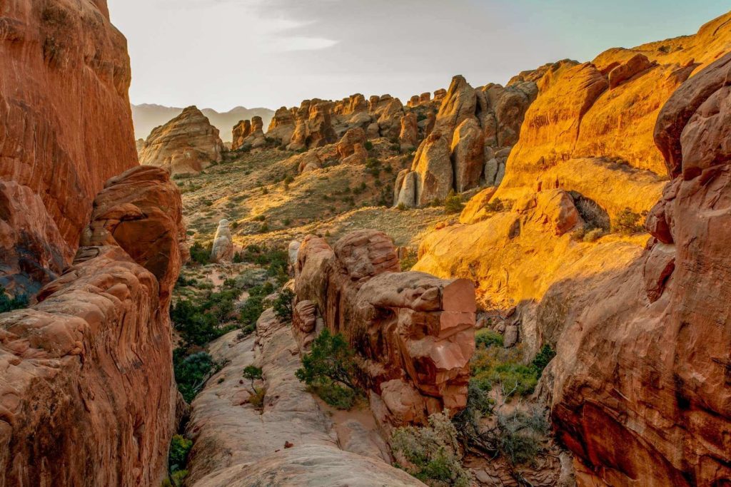 Walk along stunning rock formations on the Devil's Garden Trail