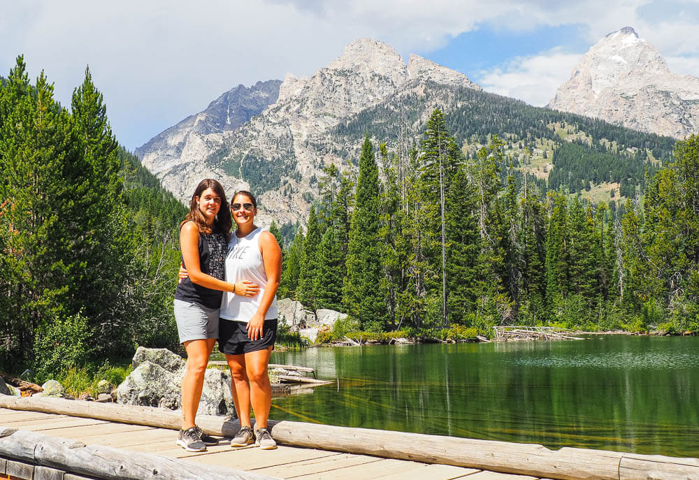 Us standing in front of the Grand Teton mountain range