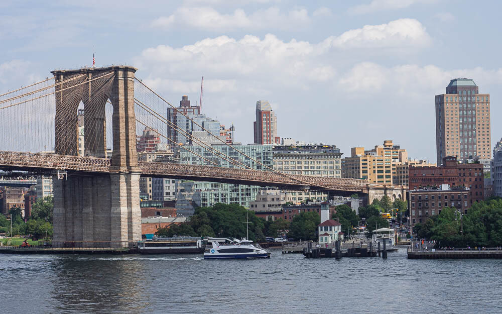 Walk on one of New York City bucket list attractions, the Brooklyn Bridge