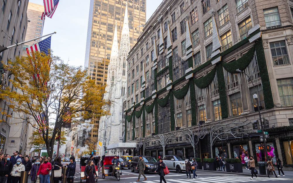 The white St. Patrick's Cathedral in the streets of NYC