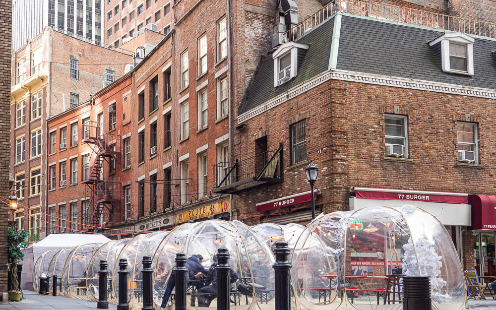 Stone Street with pop up pavilions in the winter time