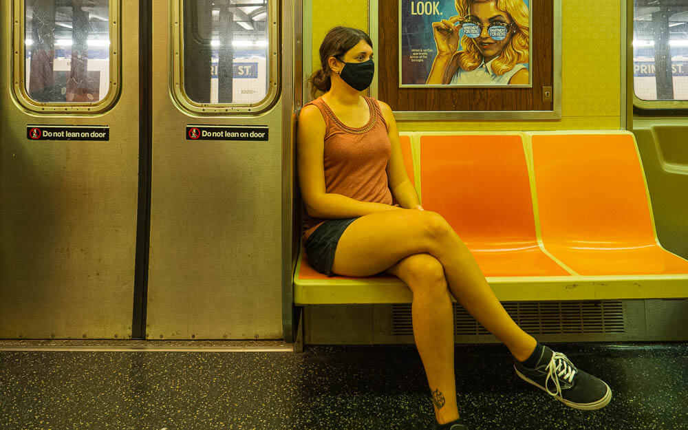 Dana riding the subway in NYC