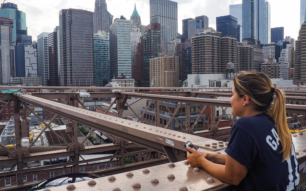 Rachel looking at the Manhattan skyline from Brooklyn Bridge