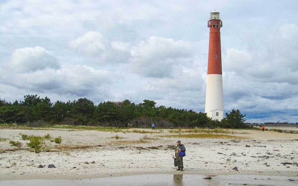 Long Beach Island with its iconic lighthouse is considered as one of the best road trips from New York