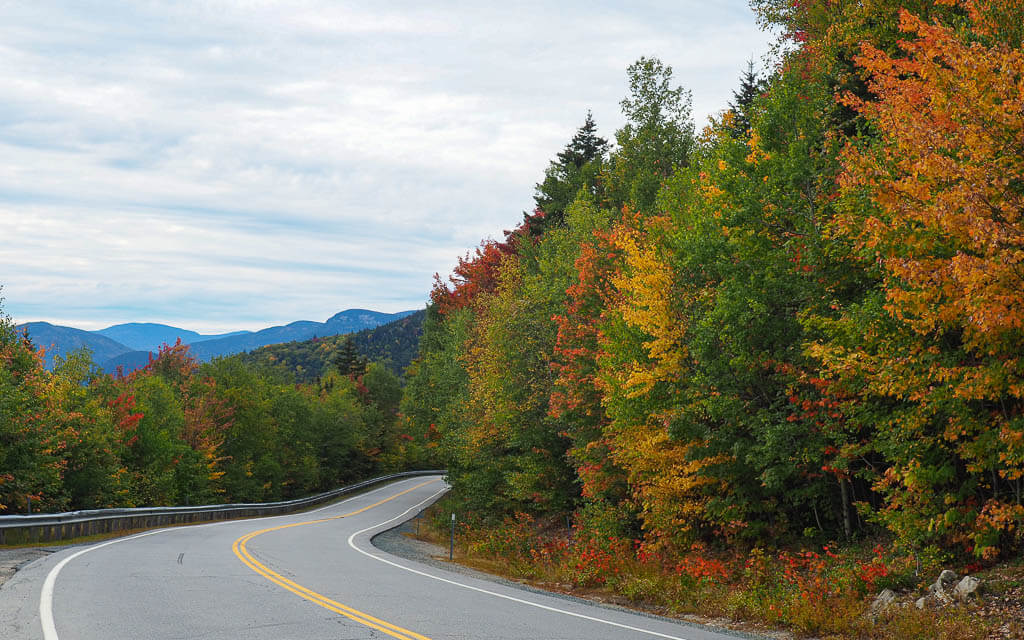 Drive on Kancamagus Scenic Byway during fall foliage