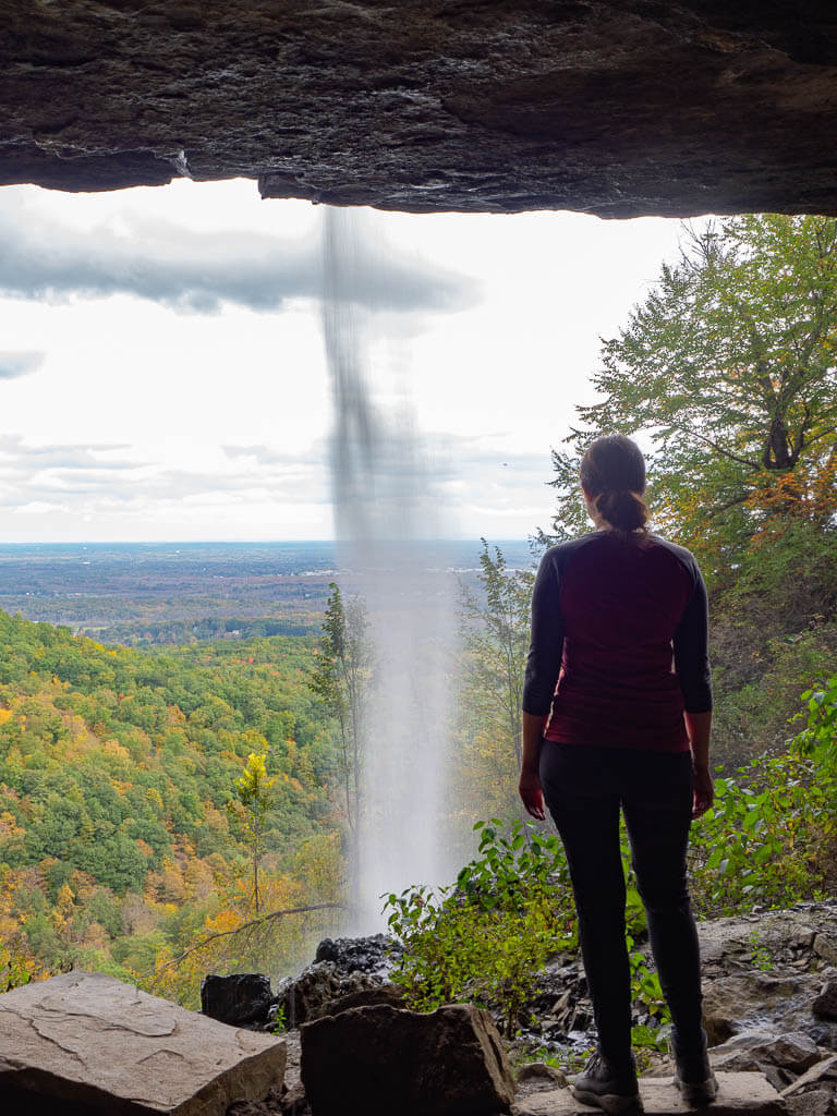 Me standing under the overhang behind the Minelot Falls on the Indian Ladder Trail